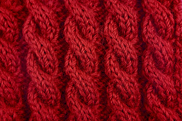 Image showing Detail of red cable knitting stitch