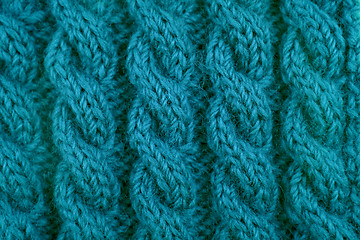 Image showing Detail of teal cable knitting stitch