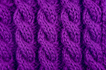 Image showing Detail of purple cable knitting stitch