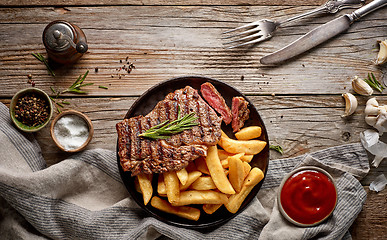 Image showing grilled beef steak and potatoes