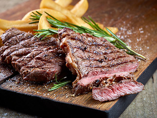 Image showing grilled beef steak and potatoes