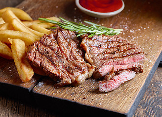 Image showing grilled beef steak and potatoes