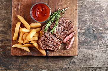 Image showing grilled beef steak and potatoes