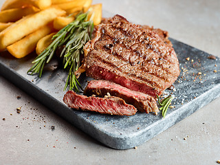 Image showing grilled beef steak and potatoes