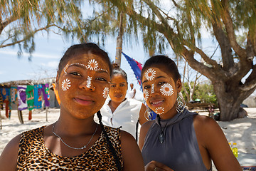 Image showing Native Malagasy Sakalava ethnic girls, beauties with decorated f