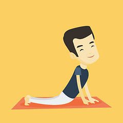 Image showing Man practicing yoga upward dog pose.