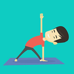 Image showing Man practicing yoga triangle pose.