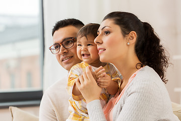 Image showing happy family with baby daughter at home