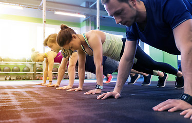 Image showing group of people exercising in gym