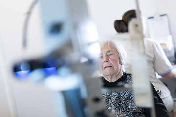 Image showing Senior woman beeing prepered for laser surgery at ophthalmology clinic.