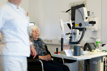 Image showing Senior woman beeing prepered for laser surgery at ophthalmology clinic.