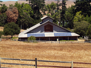 Image showing Large solar panels on public park building in setting