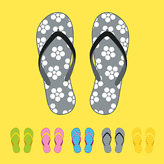 Image showing Row of colorful beach flip flops over color background
