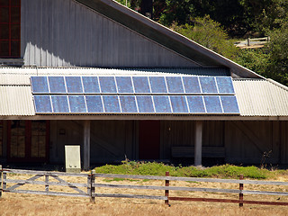 Image showing Large bank of solar panels on public building