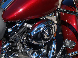 Image showing Red and chrome closeup detail of motorcycle