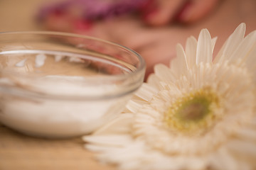 Image showing female feet and hands at spa salon