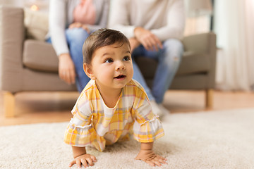 Image showing little baby girl on floor at home