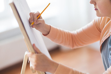 Image showing artist with pencil drawing picture at art studio