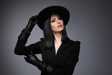 Image showing Beautiful High Fashion Model Wearing Black Hte and Leather Glove