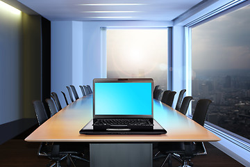 Image showing black laptop on a table