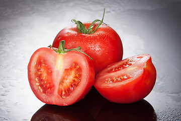 Image showing Tomatoes On A Glass Background