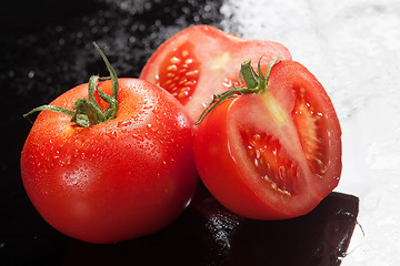 Image showing Tomatoes On A Glass Background