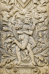 Image showing a sand stone relief of two men fighting