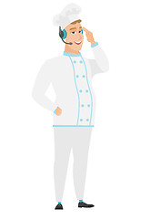 Image showing Caucasian chef cook in headset with microphone.