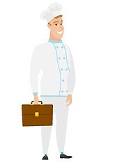 Image showing Caucasian chef cook holding briefcase.