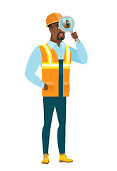 Image showing African-american builder with magnifying glass.