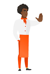 Image showing African chef cook showing stop hand gesture.