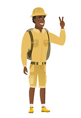 Image showing African-american traveler showing victory gesture.