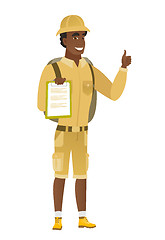 Image showing Traveler with clipboard giving thumb up.