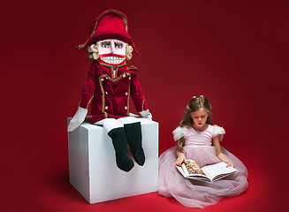 Image showing The beauty ballerina sitting with nutcracker