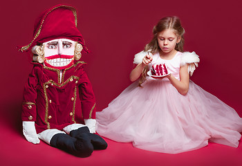 Image showing The beauty ballerina standing with nutcracker