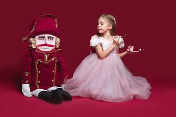 Image showing The beauty ballerina standing with nutcracker