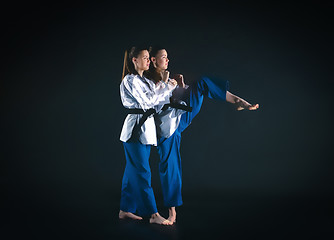 Image showing The karate girl with black belt