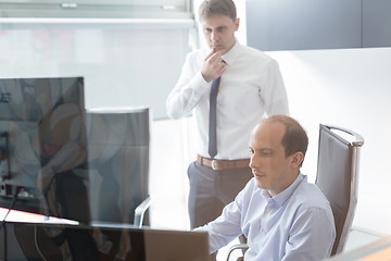 Image showing Business team analyzing data at business meeting.