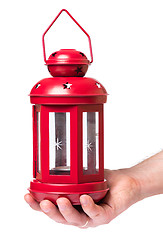 Image showing Hand holding red lantern