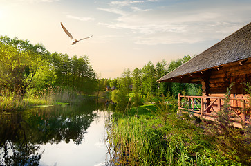 Image showing Wooden house at sunrise