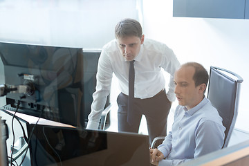 Image showing Business team analyzing data at business meeting.