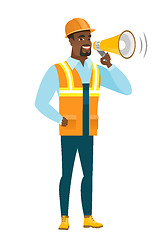 Image showing African-american builder talking into loudspeaker.