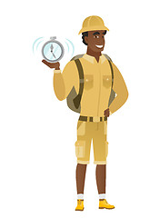 Image showing African-american traveler holding alarm clock.