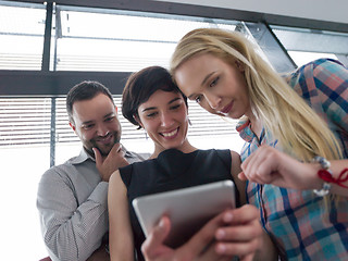 Image showing group of Business People Working With Tablet in startup office