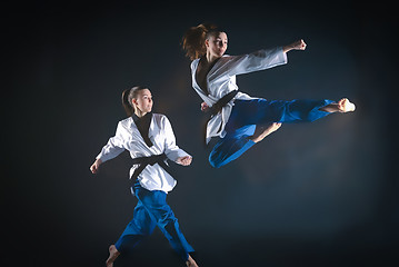 Image showing The karate girl with black belt