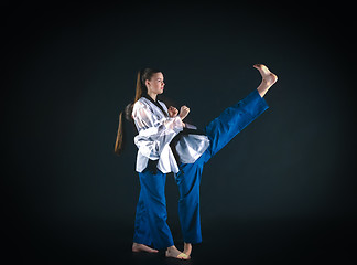 Image showing The karate girl with black belt