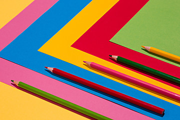 Image showing colored pencils and colour paper