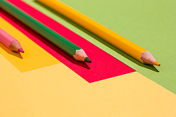 Image showing colored pencils and colour paper