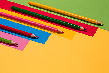 Image showing colored pencils and colour paper