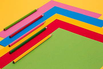 Image showing colored pencils and colour paper